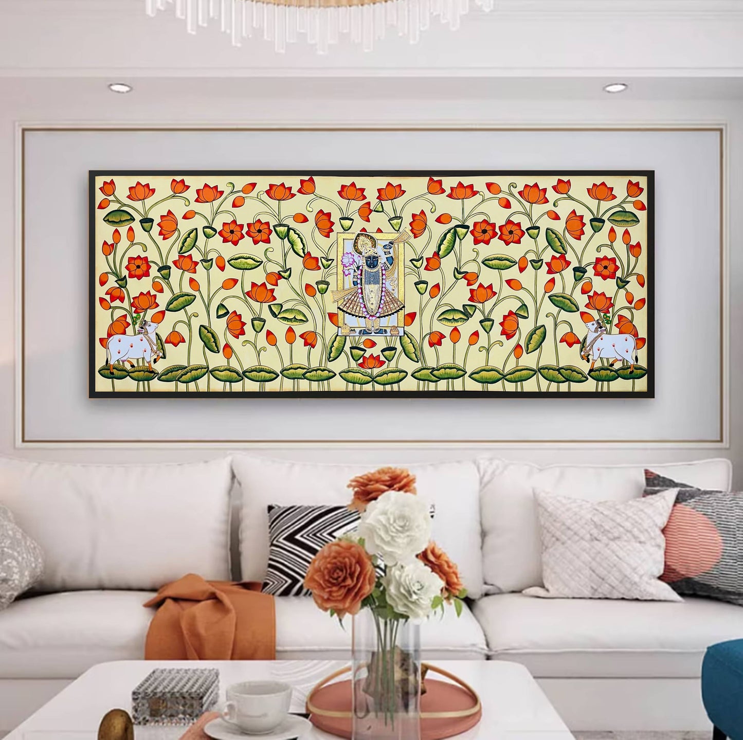 Hand-painted Pichwai painting of Shrinathji with cows and lotus flowers on living room wall